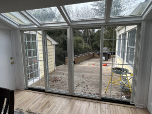 Infinity by Marvin - Cuatom Quad Sliding Patio Door Center Operating Sashes 18 Lite Contour Grids White - Princeton NJ